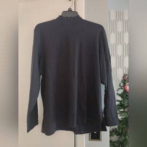 Rochelle black turtleneck never worn with tags